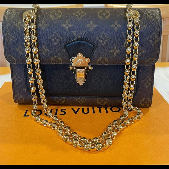 Louis Vuitton Handbags - Louis Vuitton Victoire black brown monogram chain shoulder bag.